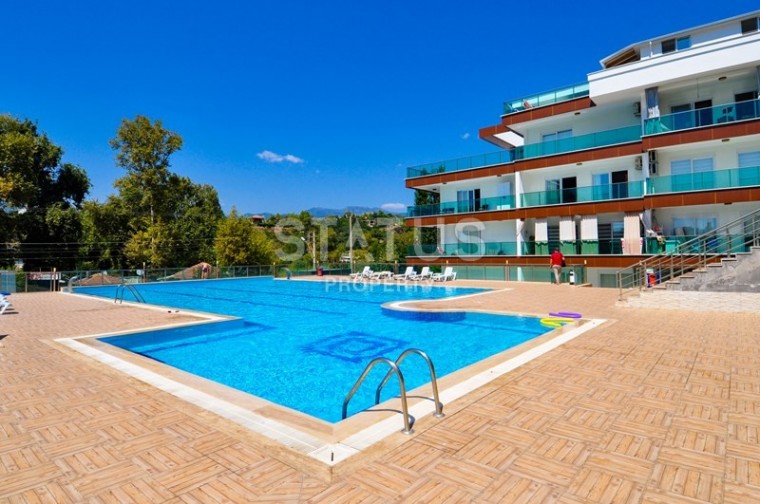 Furnished apartment 1+1 in a complex with a swimming pool, Kestel, 65 m2 photos 1