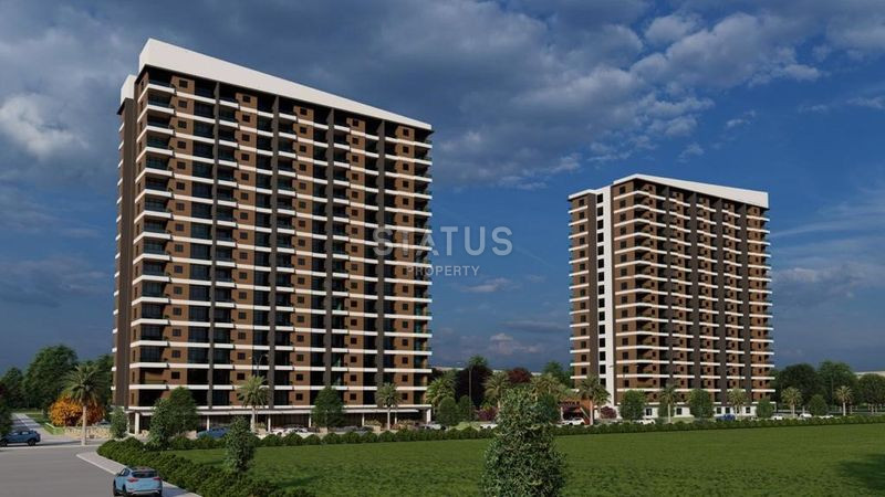 A wonderful project with excellent layouts 450m from the sea in the Tomyuk area in Mersin. 84m2 - 112m2 фото 1