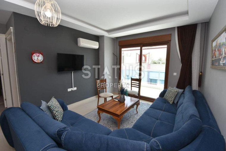 Двухкомнатная квартира с качественной мебелью в 400м от моря в Махмутларе. 55м2 фото 1