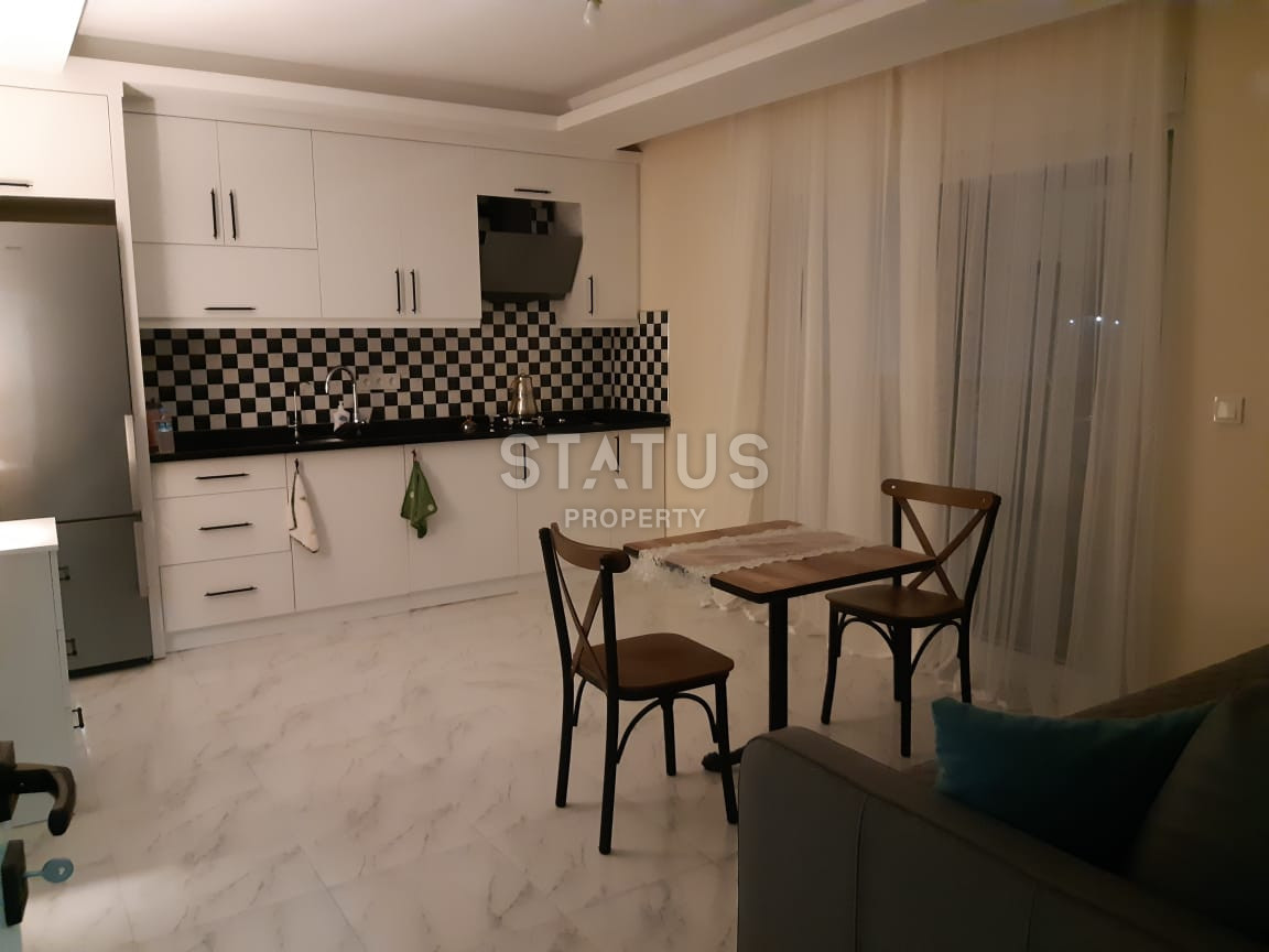 One-bedroom furnished apartment with good location and good price in Gazipasa. 60m2 фото 2