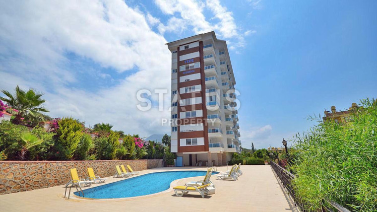Spacious two-room furnished apartment in a modern residential complex in Tosmur. 70m2 photos 1