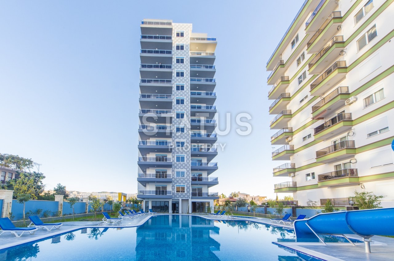 New complex with sea view apartments in Mahmutlar! фото 2