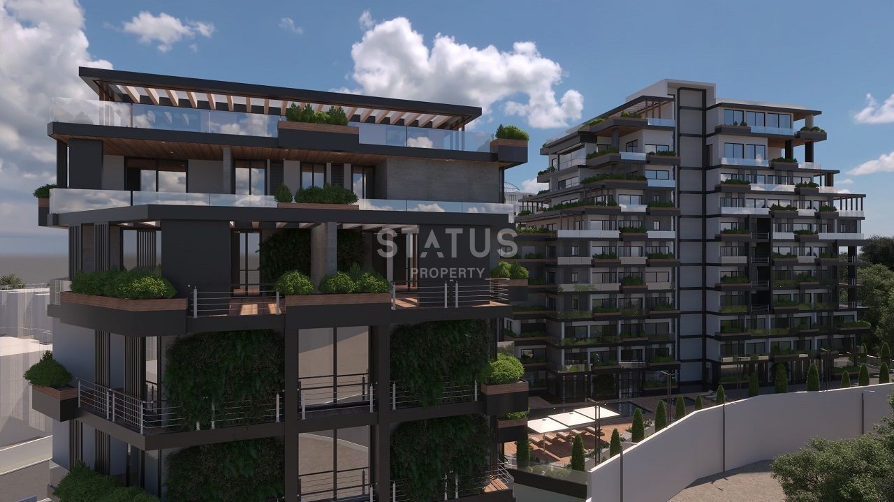 Apartment 3+1 (117.79m? ) in a luxurious modern complex in the center of Kyrenia фото 1