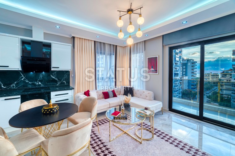Comfortable apartment 1+1 with designer furniture and renovation in Mahmutlar, 60m2 photos 1
