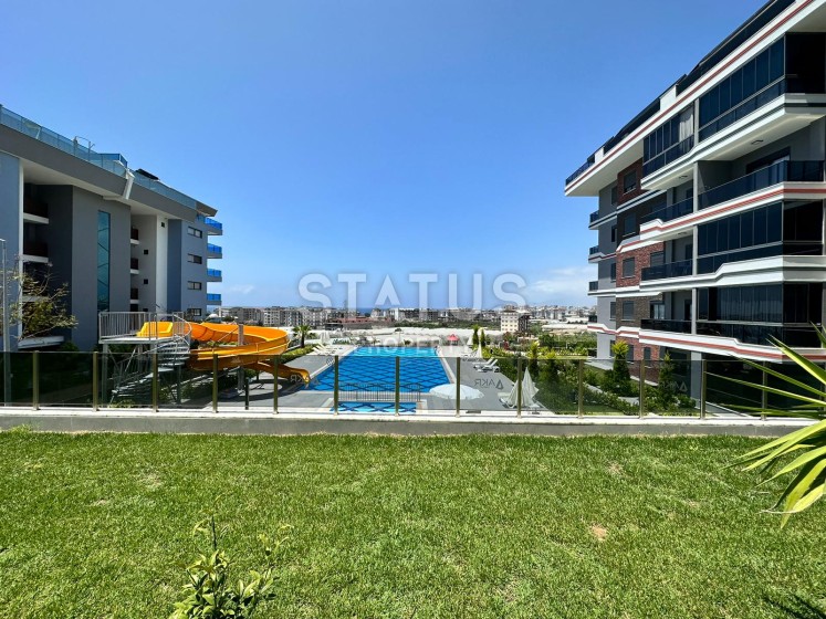 Cozy furnished 1+1 apartment with private garden in a new complex in Kargicak, 50m2 photos 1