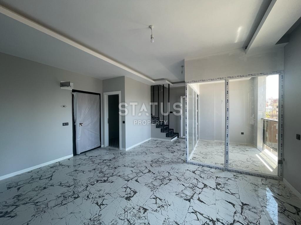 Three-room apartment in Mahmutlar with two bathrooms фото 1