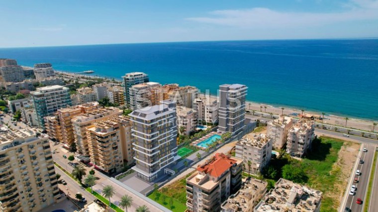 Project in Mahmutlar district. 10 meters from the sea! Five% installments! 57-187 m2 photos 1