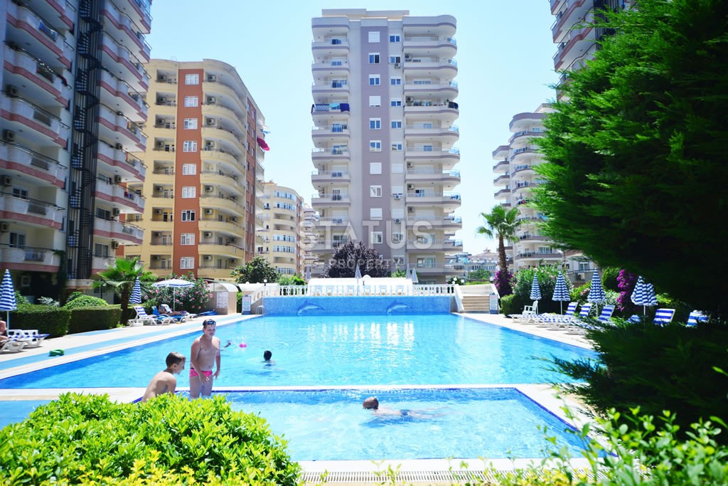 Three-room apartment in a complex with water slides in Mahmutlar, 120 m2 фото 1