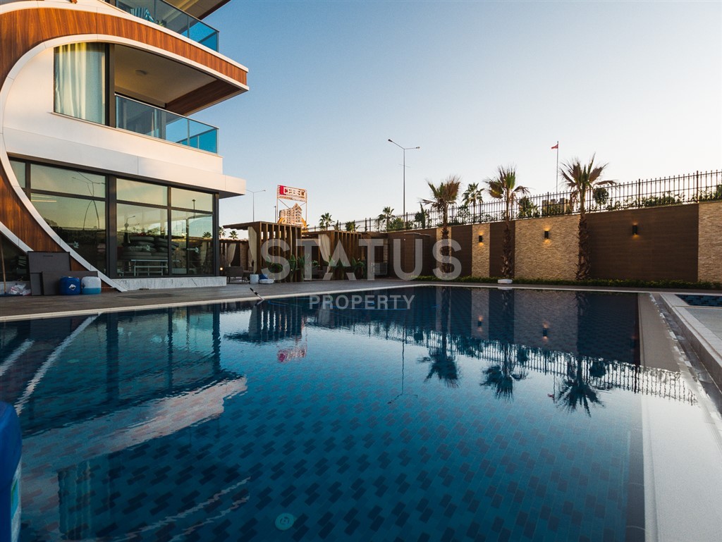 Luxurious apartments 4+1 on the first coastline in Kestel фото 1