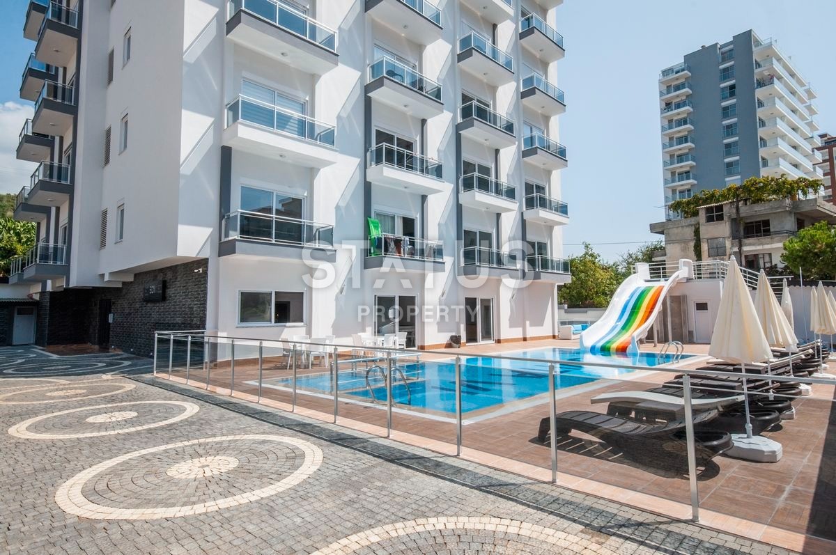 Furnished apartment 1+1 in a complex with infrastructure 47 m2. Mahmutlar, Alanya. фото 1