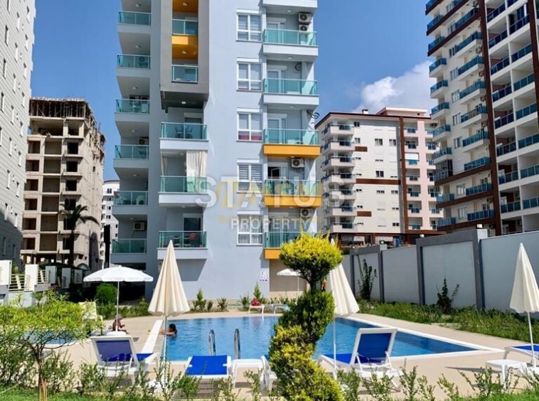 Apartment 1+1 with a view of the Taurus Mountains, 65 m2. Mahmutlar, Alanya. фото 1