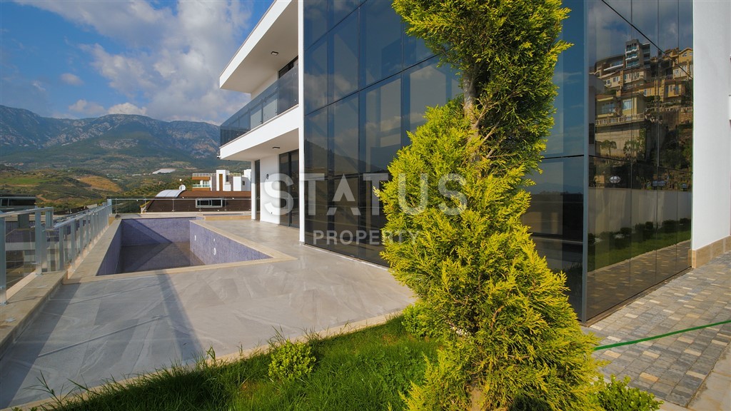 Luxurious detached villa 4+1 with a beautiful panorama, 550 m2. Kargicak, Alanya. фото 1