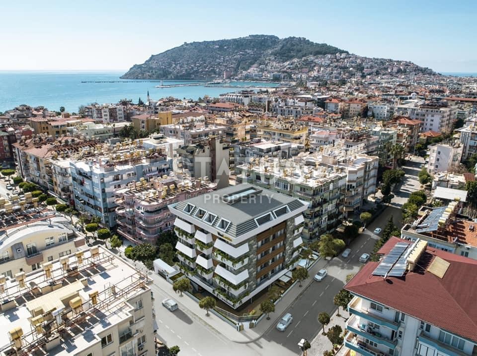 Apartments 0+1 and 1+1 in a complex under construction in the center of Alanya. фото 1