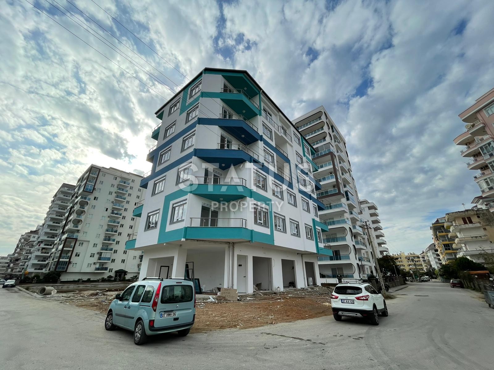 Апартаменты 1+1 в новом комплексе в центре Махмутлара, 45 м2. фото 1