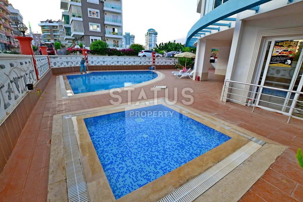 Inexpensive apartment in Mahmutlar in a new complex 200 meters from the sea. 75 sq.m. фото 1