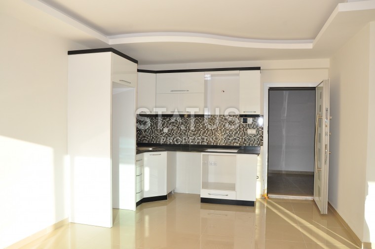 Excellent apartment in a luxury complex with sea views in Mahmutlar 68 sq.m photos 1