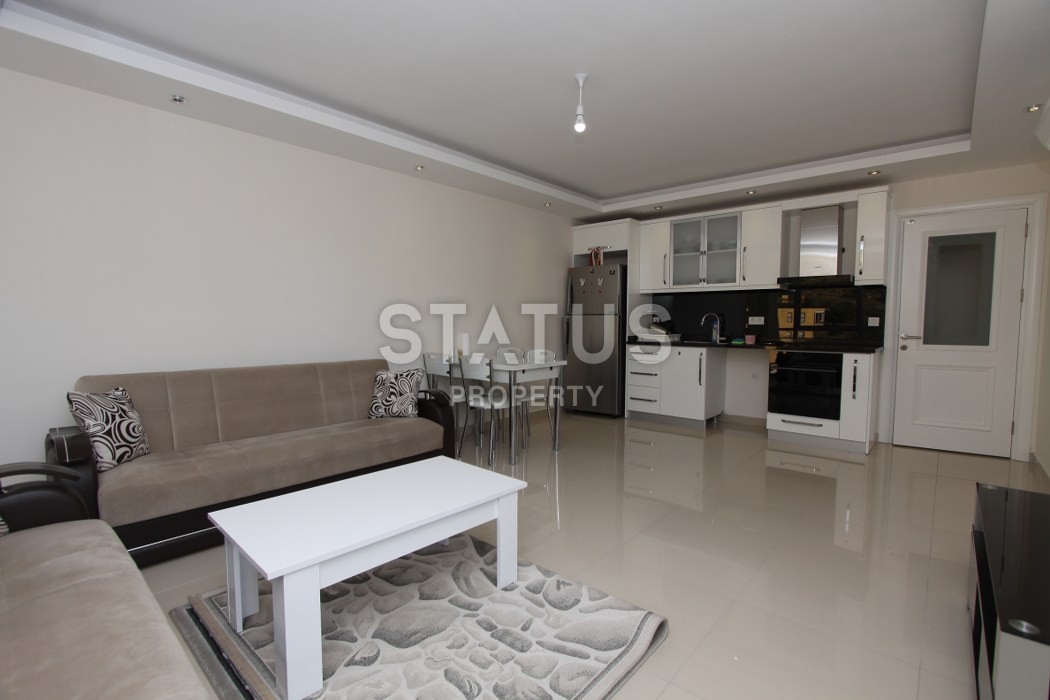 Furnished apartment in the center of Alanya on a high floor! 65 sq.m. фото 2