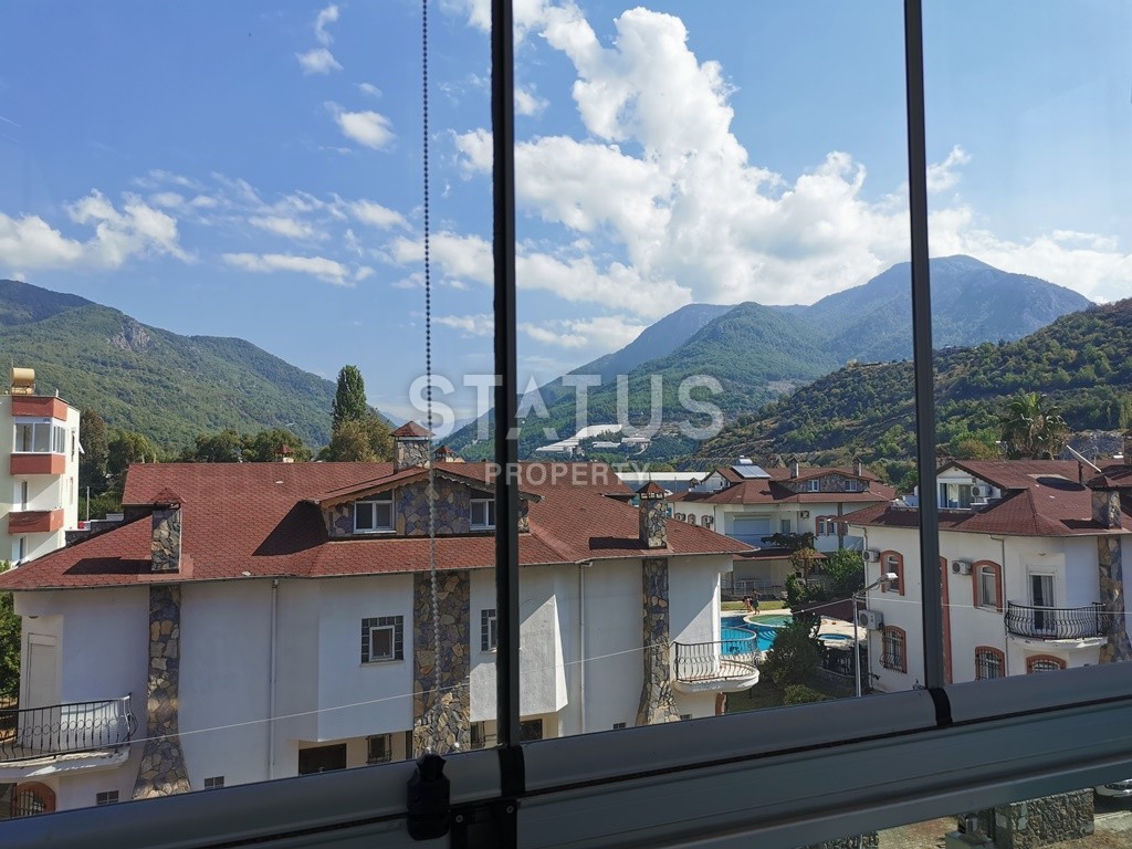 Apartment 1+1 in a complex with a swimming pool and a private promenade, 80 m2. Tosmur, Alanya. фото 1