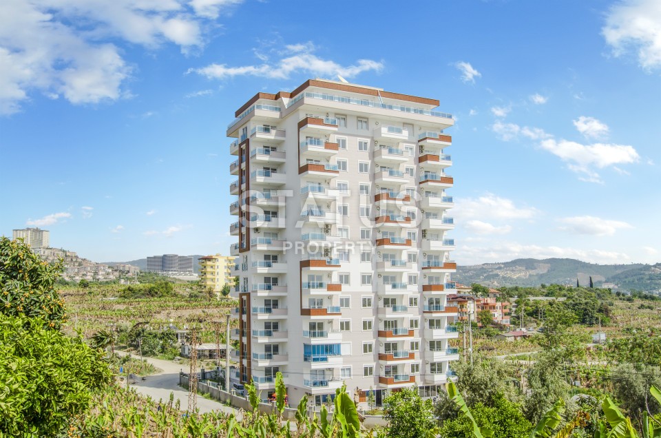 Furnished apartment 1+1 overlooking the sea and the historic city of Naula, 75 m2. Mahmutlar, Alanya. фото 2