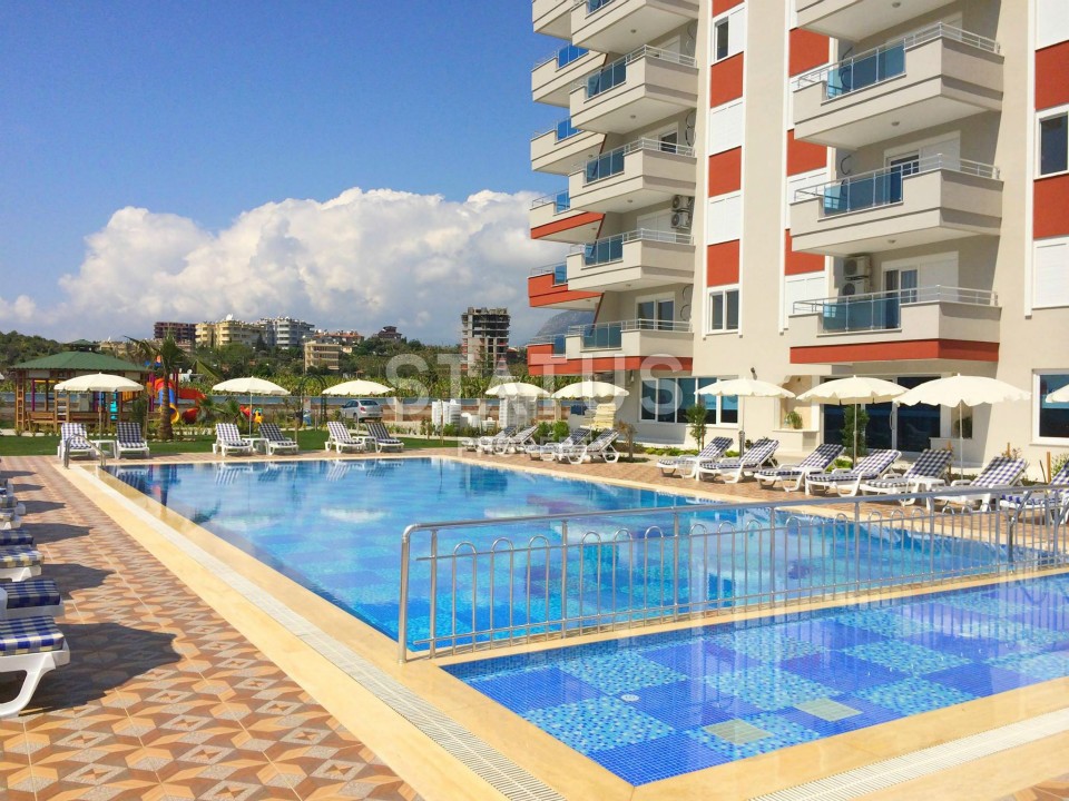Апартаменты 1+1, 65 м2 в хорошем комплексе. Махмутлар, Алания. фото 1