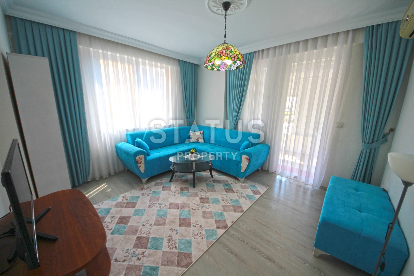 Spacious apartment 2+1 with a separate kitchen, 105 m2 in the center of Mahmutlar. фото 1