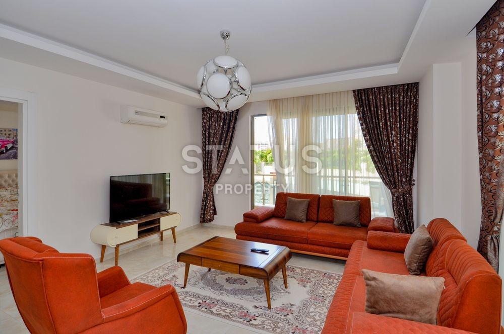 Furnished large one-bedroom apartment in an excellent area of Mahmutlar, 90 sq.m. фото 2