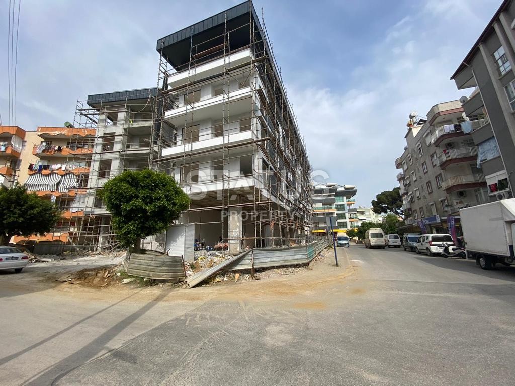 Апартаменты 1+1 в комплексе на завершающем этапе строительства в центре Алании, 58 м2 фото 2