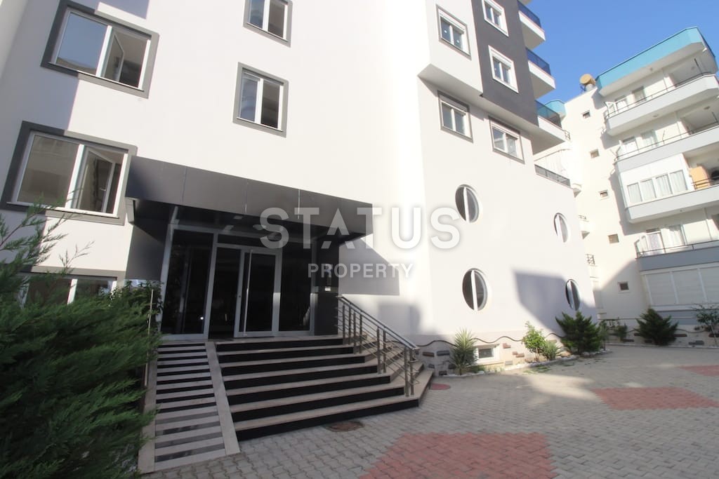 Квартира в новом доме в Махмутларе по улице Ататюрка 65 кв.м. фото 2