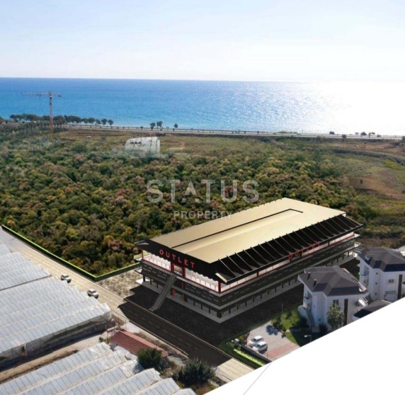 Commercial premises from 32 m2 in the shopping center of the Payallar resort area. фото 1