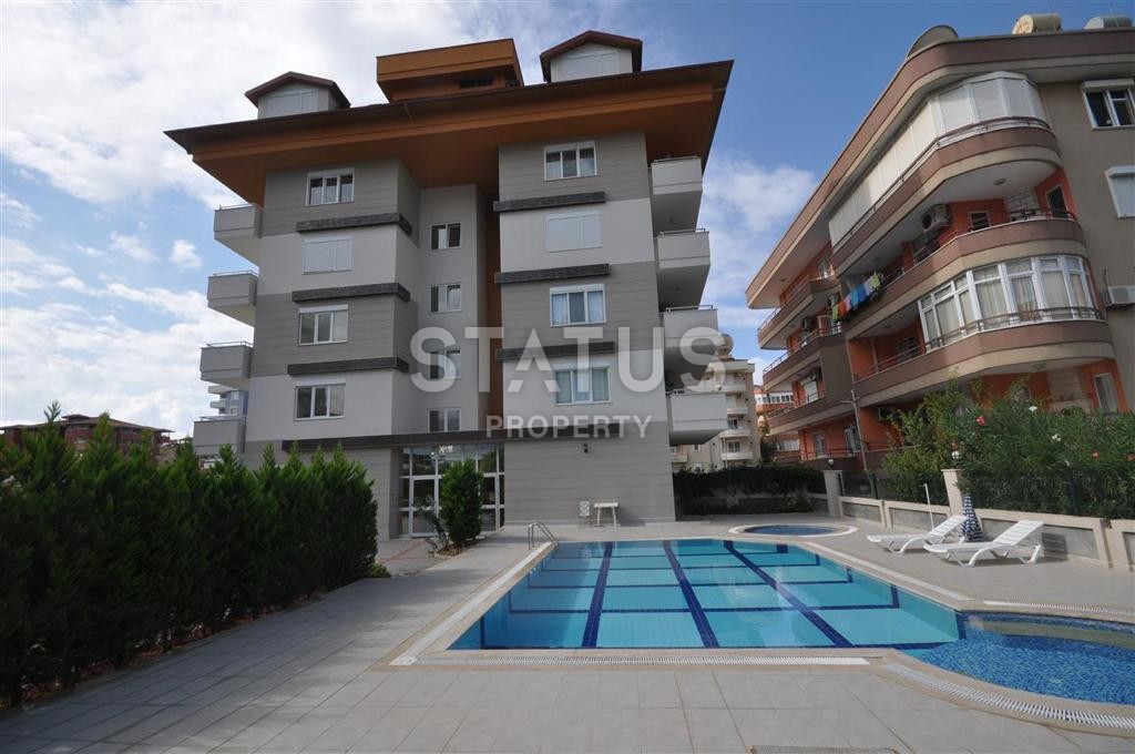 Apartment 1+1 within walking distance from the sea 65m2. Tosmur, Alanya. фото 1
