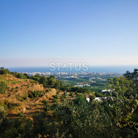 Land plot of 1000 m2 overlooking the Mediterranean Sea. Mahmutlar, Alanya. photos 1