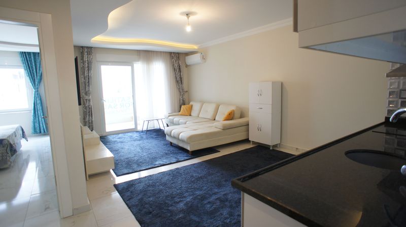 Apartment 1+1 furnished in the center of the popular area of Mahmutlar, 60 m2. фото 1