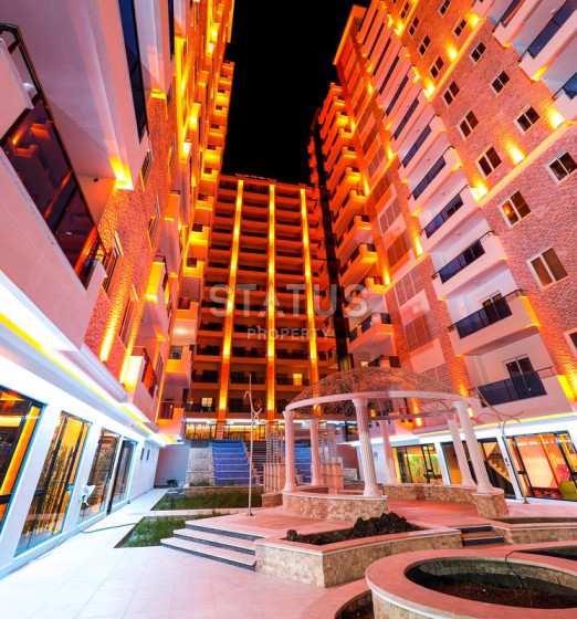 Две квартиры 1+1 в комплексе с отельной инфраструктурой в Махмутларе, 70 кв.м. фото 1