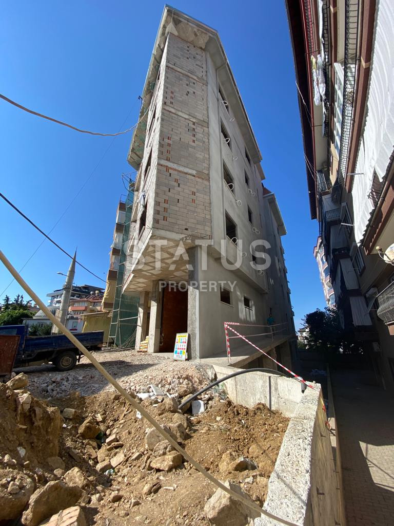 Апартаменты разных планировок на финальной стадии строительства в центре Алании, от 60 до 150 м2. фото 2