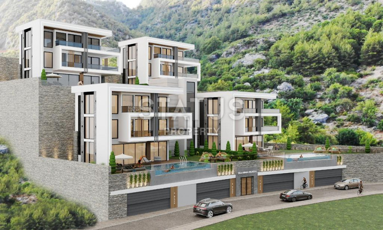 Villas 5+1 with a garden and a panoramic view of the sea and the fortress in the center of Alanya, 315 m2. photos 1