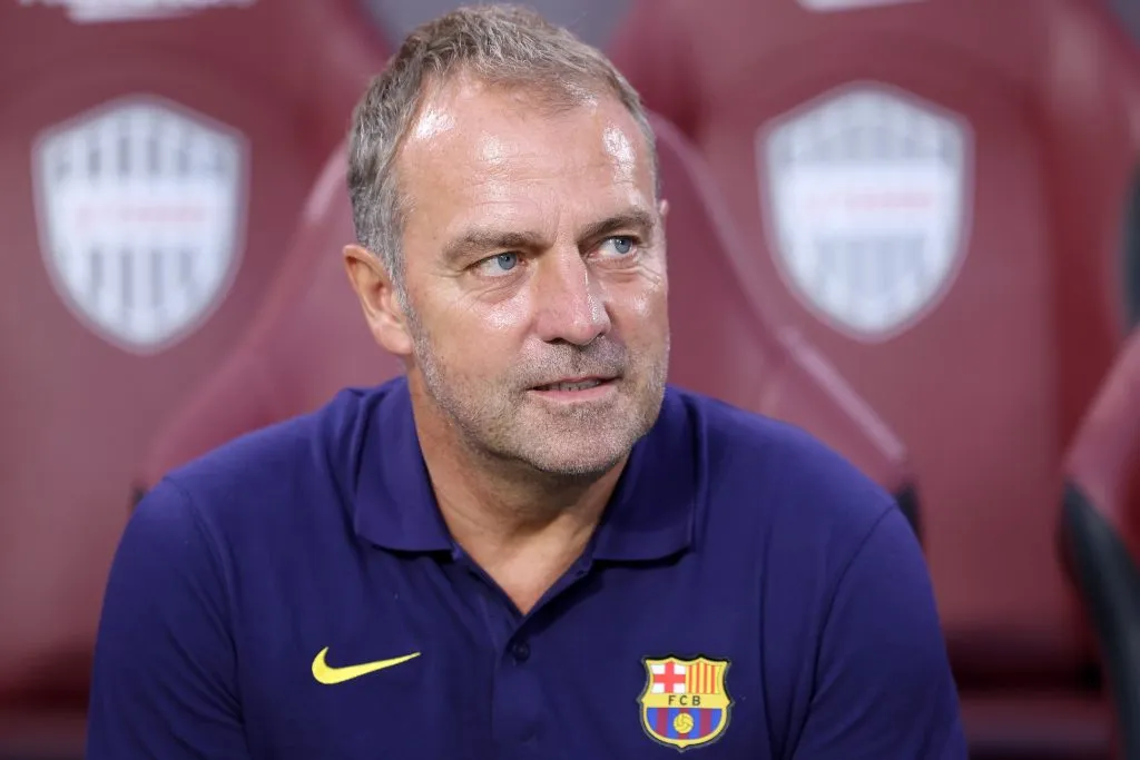 KOBE, JAPAN - JULY 27: FC Barcelona's coach Hansi Flick looks on before the preseason friendly between Vissel Kobe and FC Barcelona at Noevir Stadium Kobe on July 27, 2025 in Kobe, Hyogo, Japan. (Photo by Paul Miller/Getty Images)