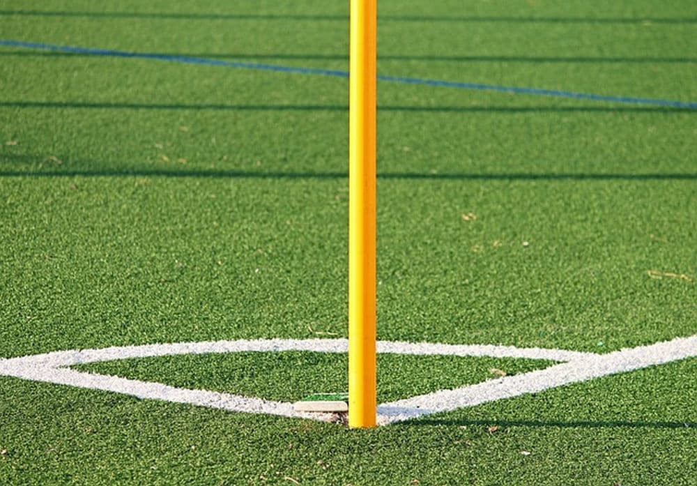 The various applications of artificial grass in sports fields and playgrounds