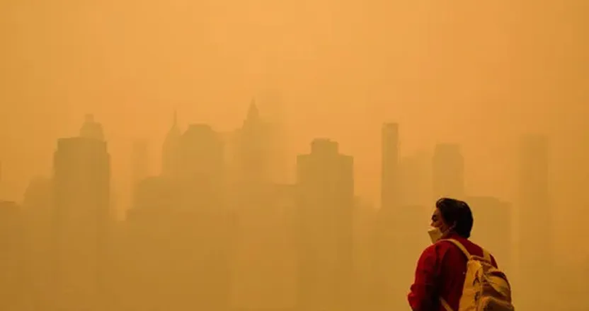 Software development team reviewing MVP product roadmap on a whiteboard with sticky notes and user stories