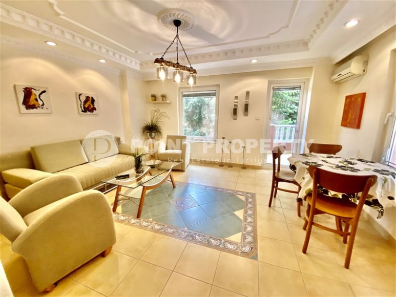 Spacious apartment with one bedroom, living room, separate kitchen and three balconies in a complex with an outdoor swimming pool.-id-4299-photo-1