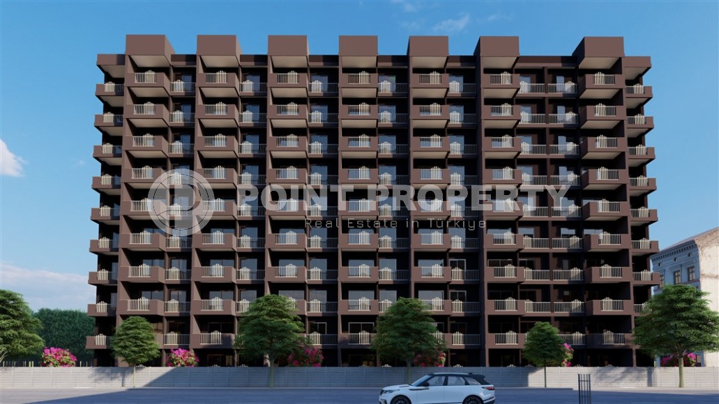 Новый проект в живописном районе Мерсина - Чешмели - 10-этажный жилой комплекс с богатой внутренней инфраструктурой-id-5973-фото-1