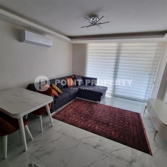 Small apartment with a laconic design, 500 meters from the sea, in the center of Alanya-id-6013-photo-1
