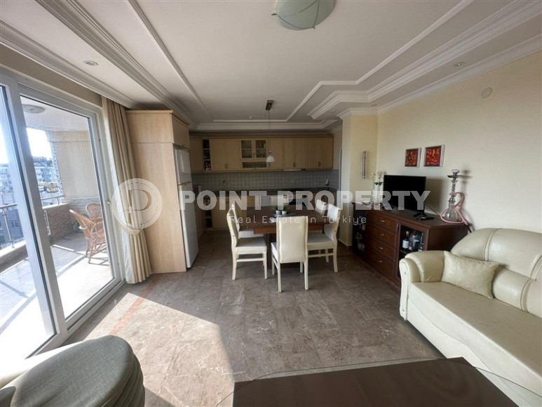 Furnished duplex apartment on the 7th floor with an attic, 300 meters from the beach, in the center of a quiet area of Alanya - Tosmur-id-6037-photo-1