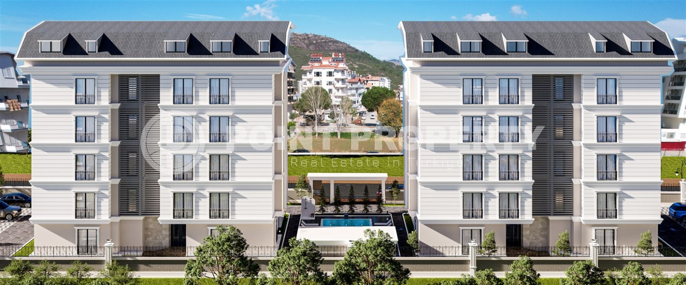 Apartments of different layouts in a residential complex at the final stage of construction, in a green, picturesque area of Alanya - Gazipasa-id-6118-photo-1