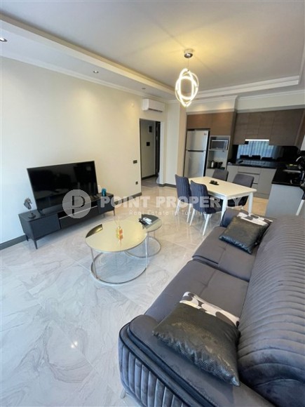 Modern 1+1 apartment, on an area of 63 m2, in the center of a picturesque, quiet area of Alanya - Kargicak-id-6204-photo-1