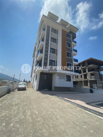 Апартаменты с тремя спальнями, 100м², в резиденции на окончательном этапе строительства в районе Газипаша, Алания-id-1490-фото-1