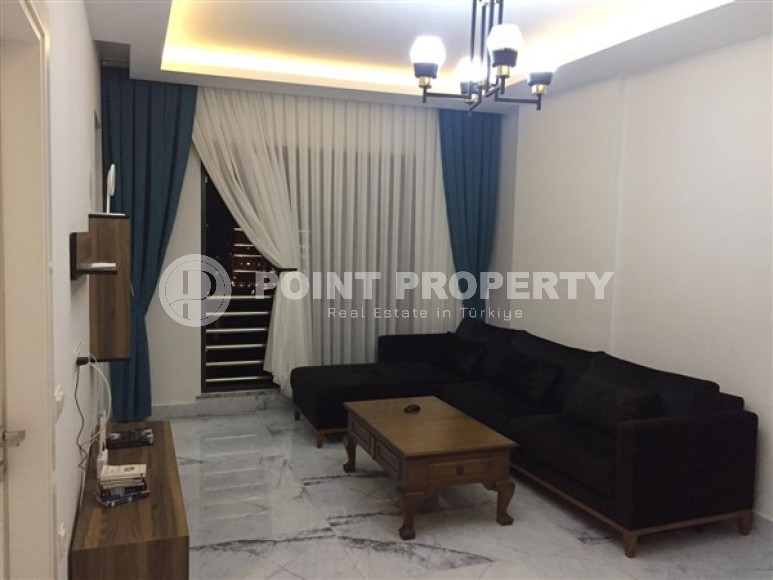 Cozy one bedroom apartment, 57m² in a new residence in Mahmutlar, Alanya-id-1504-photo-1