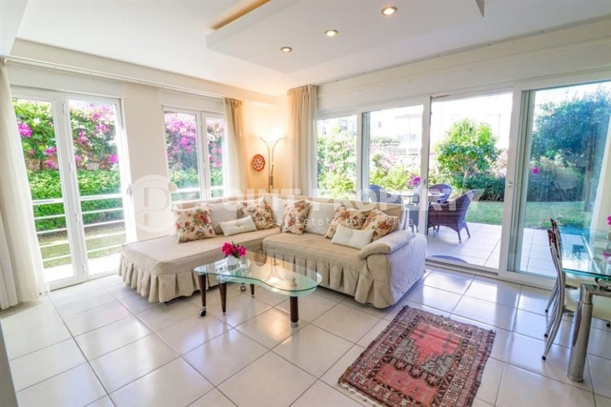 Spacious apartment with two bedrooms and a spacious terrace in the garden, 250 meters from the sea-id-6449-photo-1