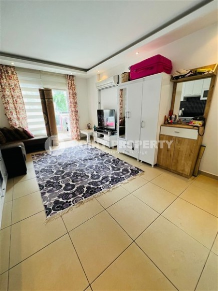 Compact studio with a total area of 40 m2, on the 1st floor, in the center of Mahmutlar district-id-6496-photo-1