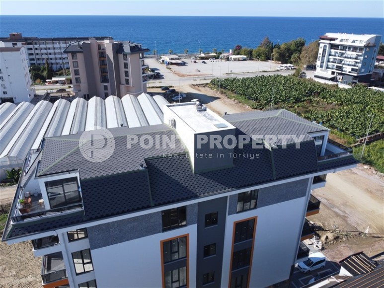 One-bedroom apartment, 50m², in a complex under construction 217m from the sea, Alanya, Kargicak-id-2167-photo-1