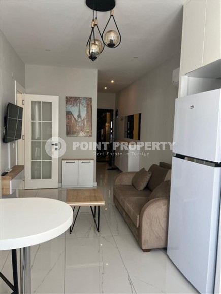 Compact, modern 1+1 apartment, on the 4th floor in a residential complex built in 2020-id-6577-photo-1